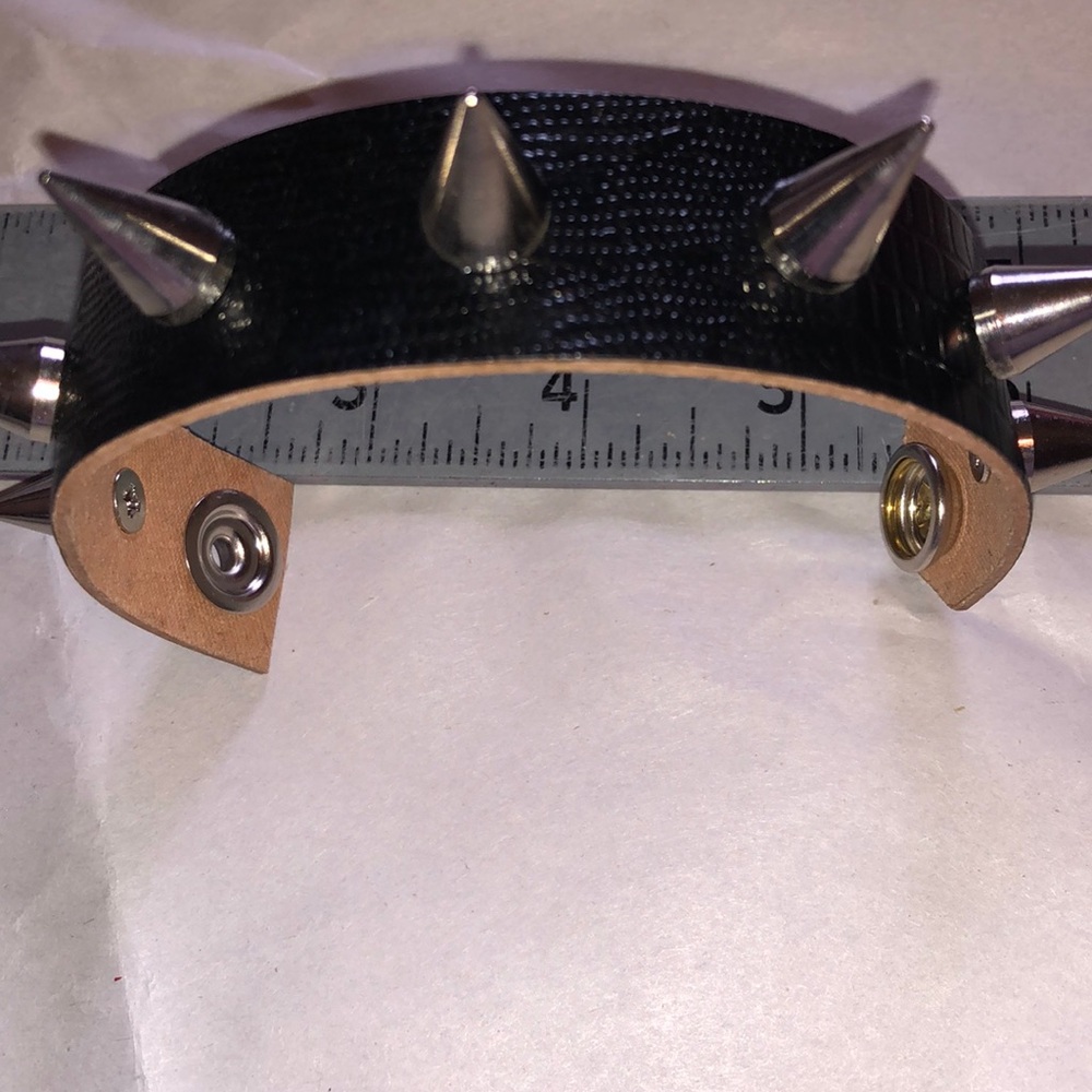 3 for $11 black “crocodile” spike bracelet.